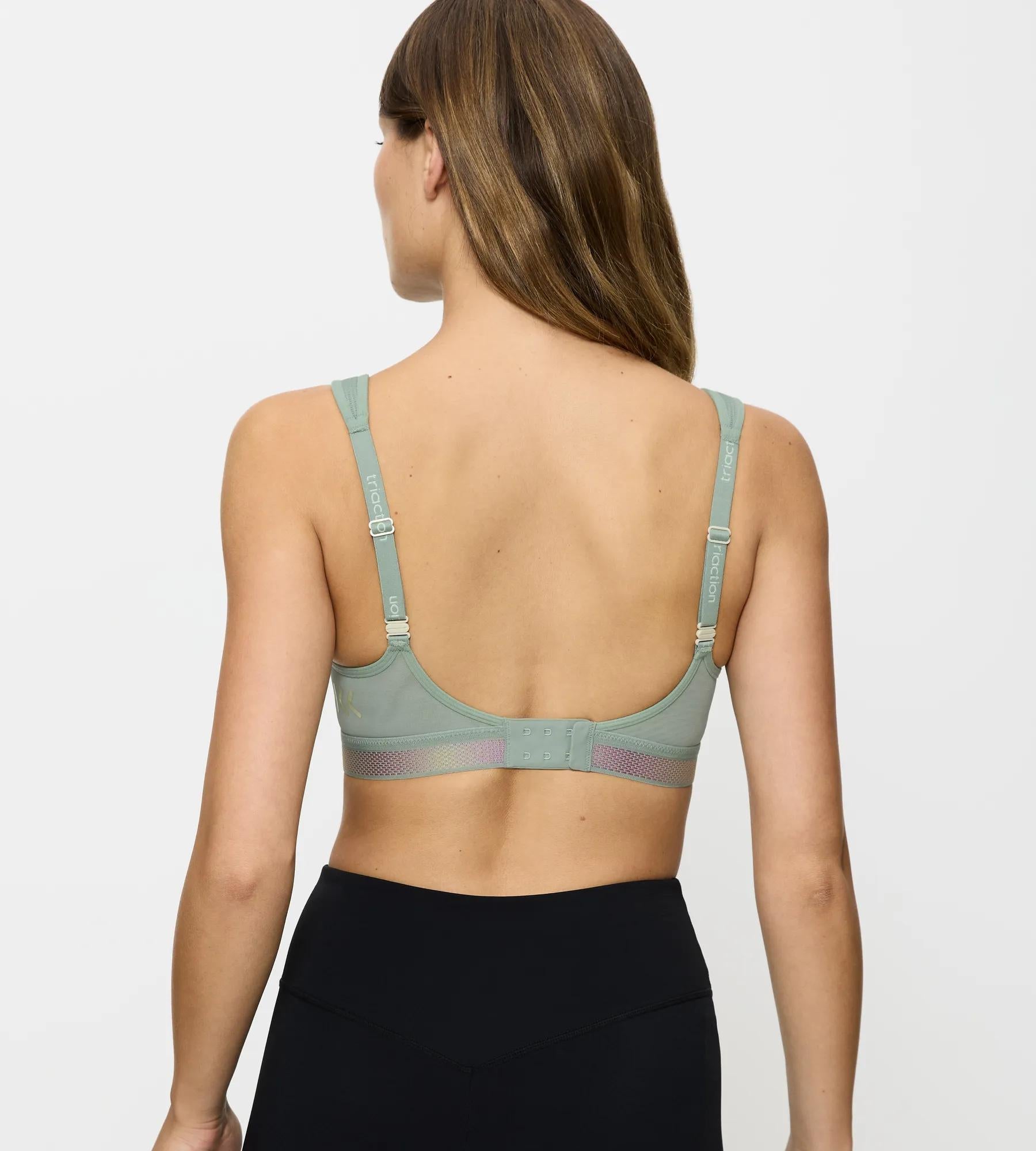 Back view of a woman wearing the Triaction Cardio Flow sports bra, showing the soft straps and flat closure.