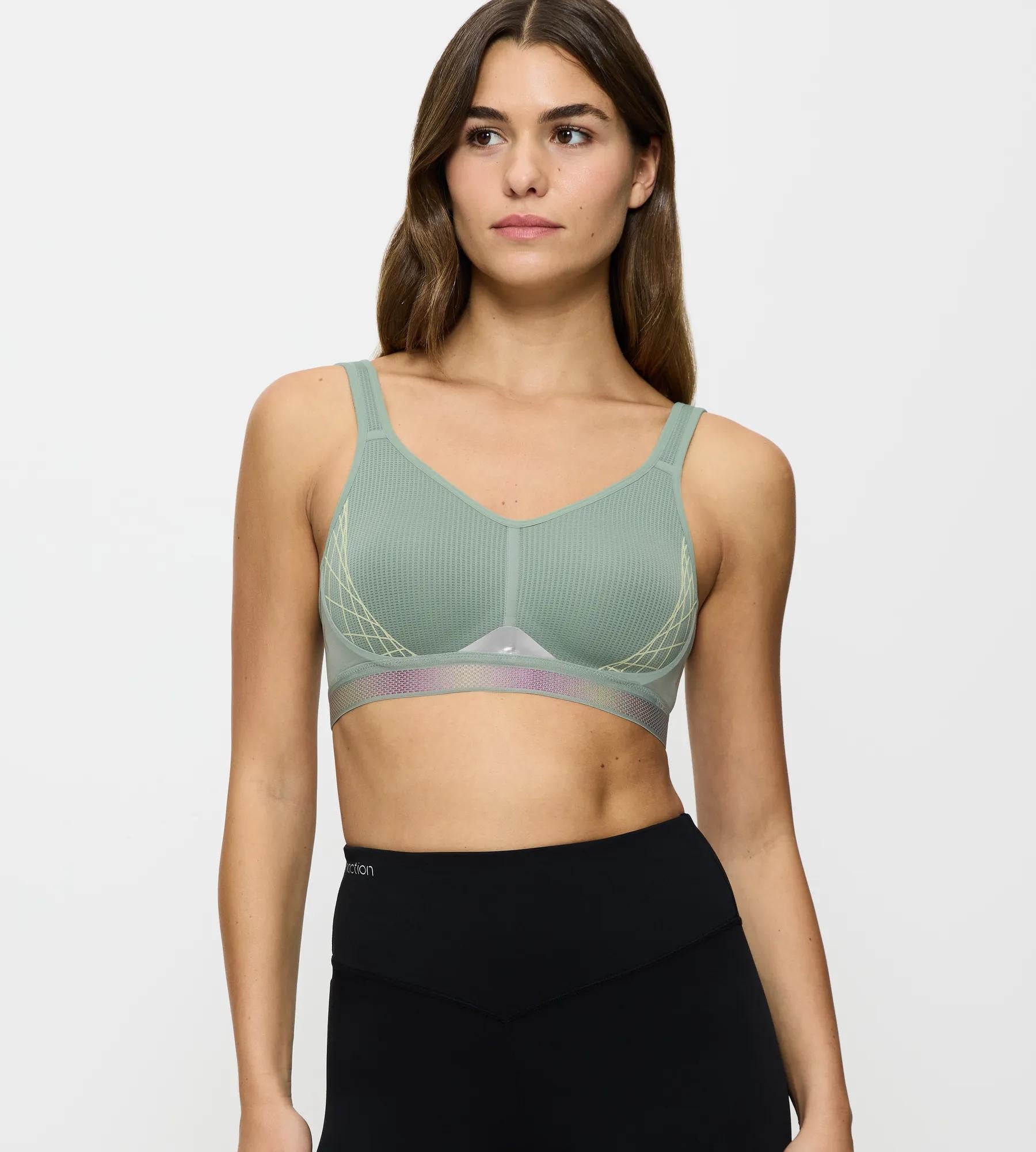 Triaction Cardio Flow sports bra in green, offering extreme support and comfort for workouts with a flat closure and padded straps.