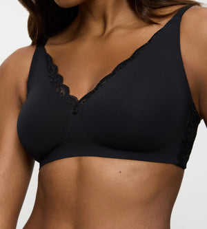 Amourette wireless minimiser bra with lace details, offering a smooth silhouette and seamless style.