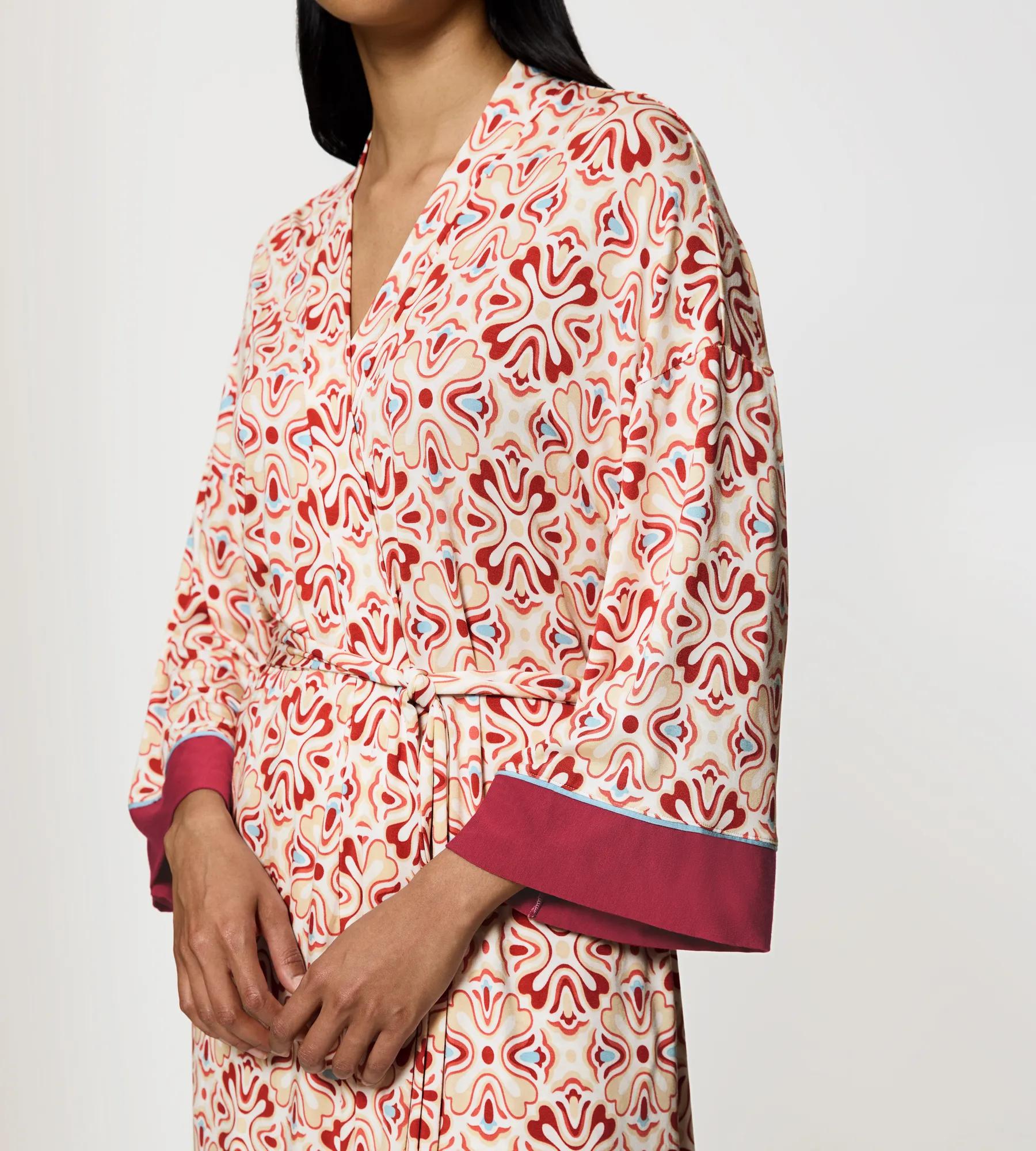 Aura Spotlight kimono-inspired robe with dropped shoulders in elegant design and soft belt for a flattering fit.
