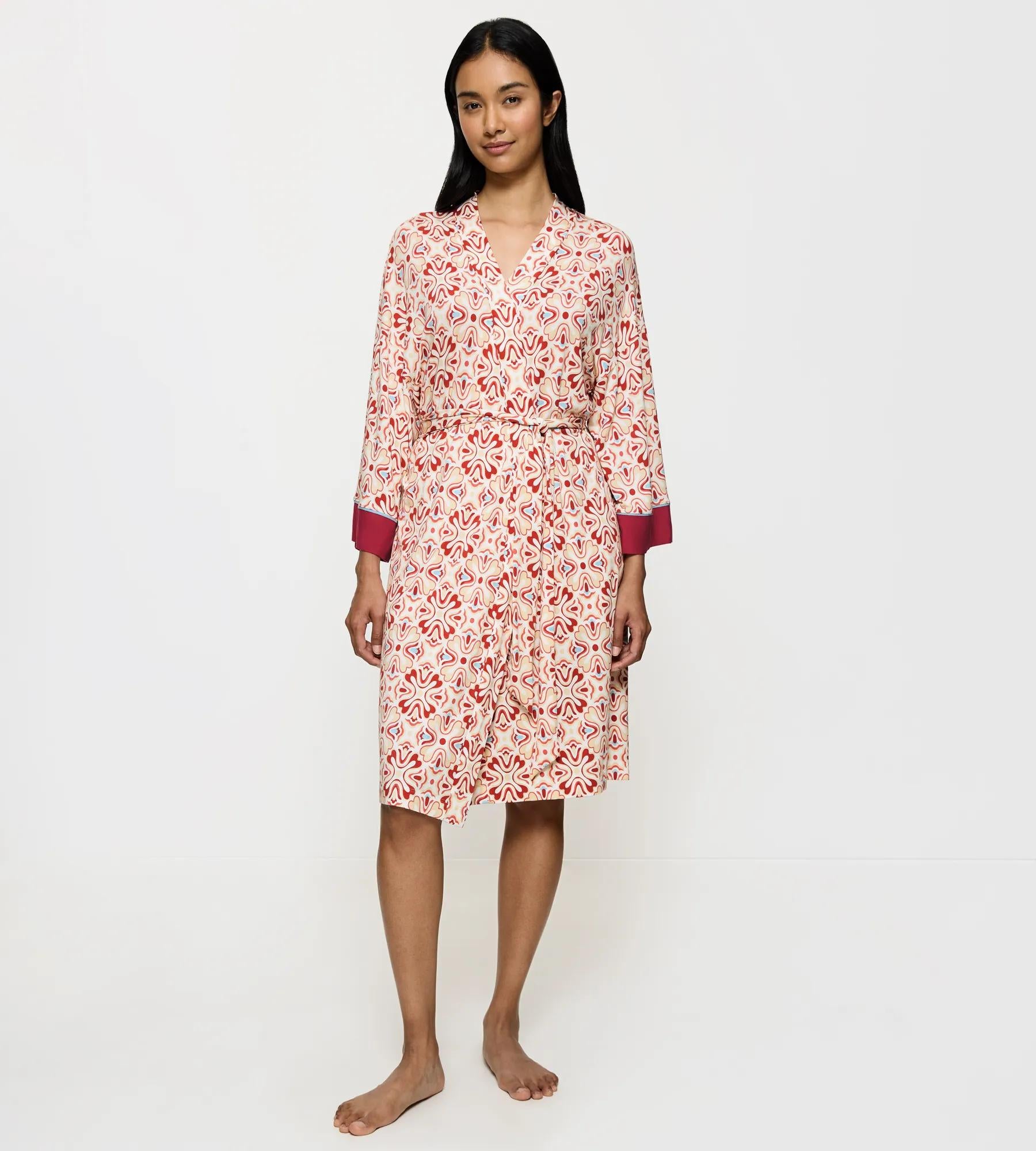 Aura Spotlight Japanese-style kimono robe with stylish pattern and soft belt for a flattering fit.