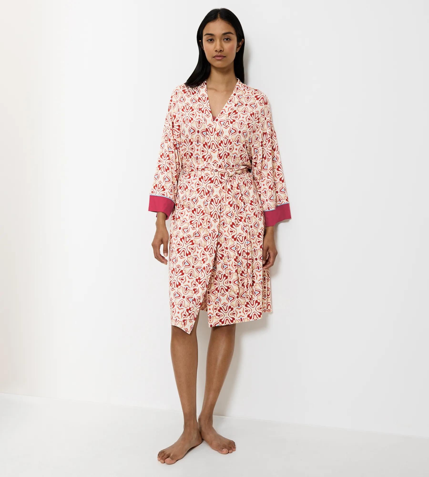 Aura Spotlight Kimono-inspired robe in floral print, featuring dropped shoulders and soft belt for a flattering fit.