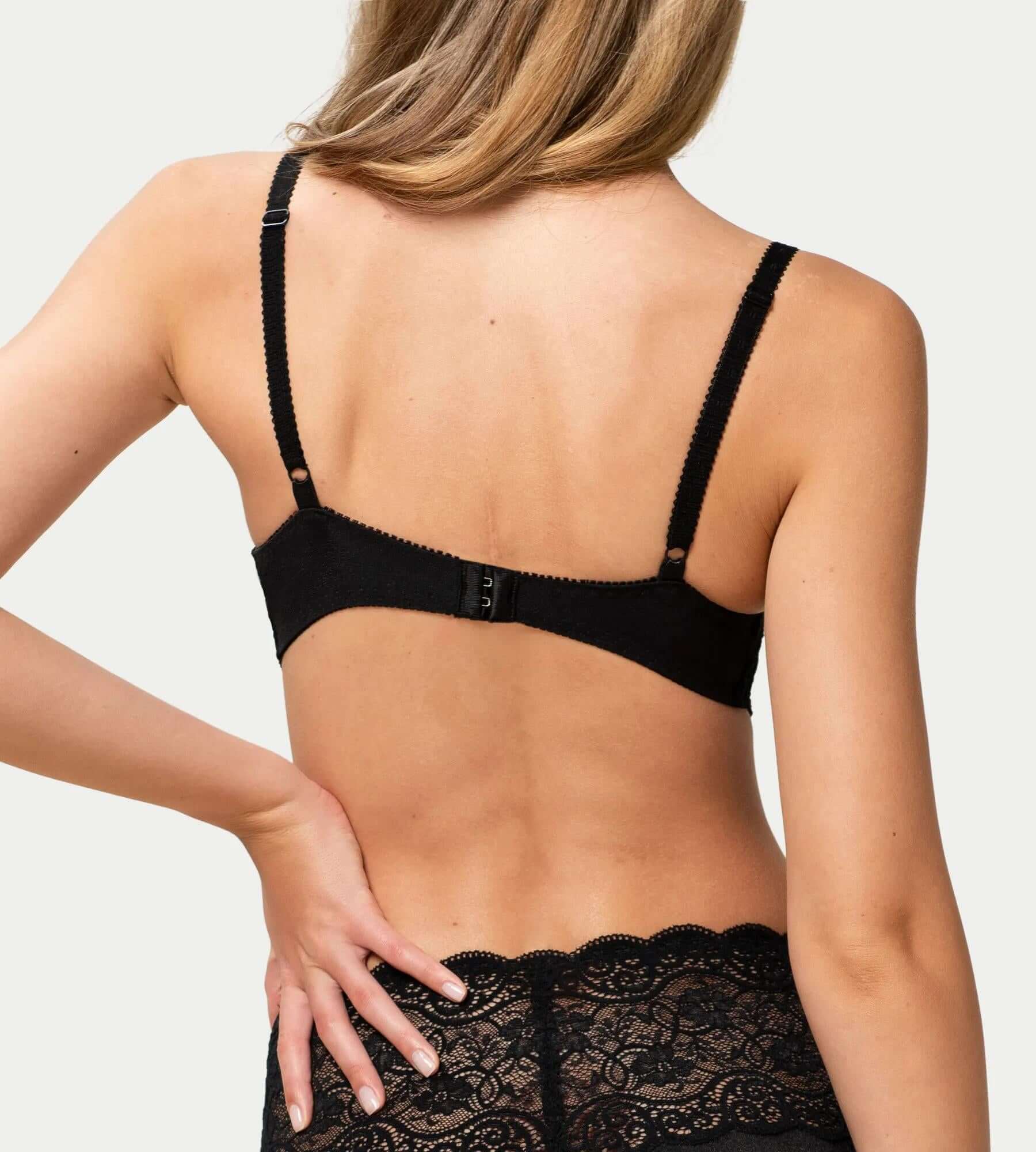Back view of the Amourette 300 black bra, showcasing delicate lace and adjustable straps.