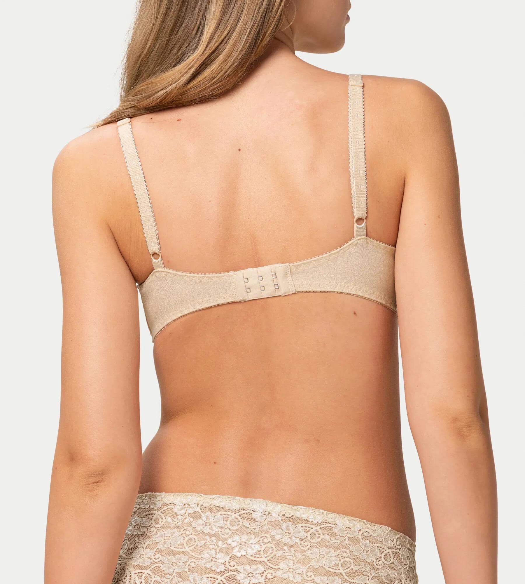 Amourette 300 skin bra featuring a delicate back design and adjustable straps for comfort.
