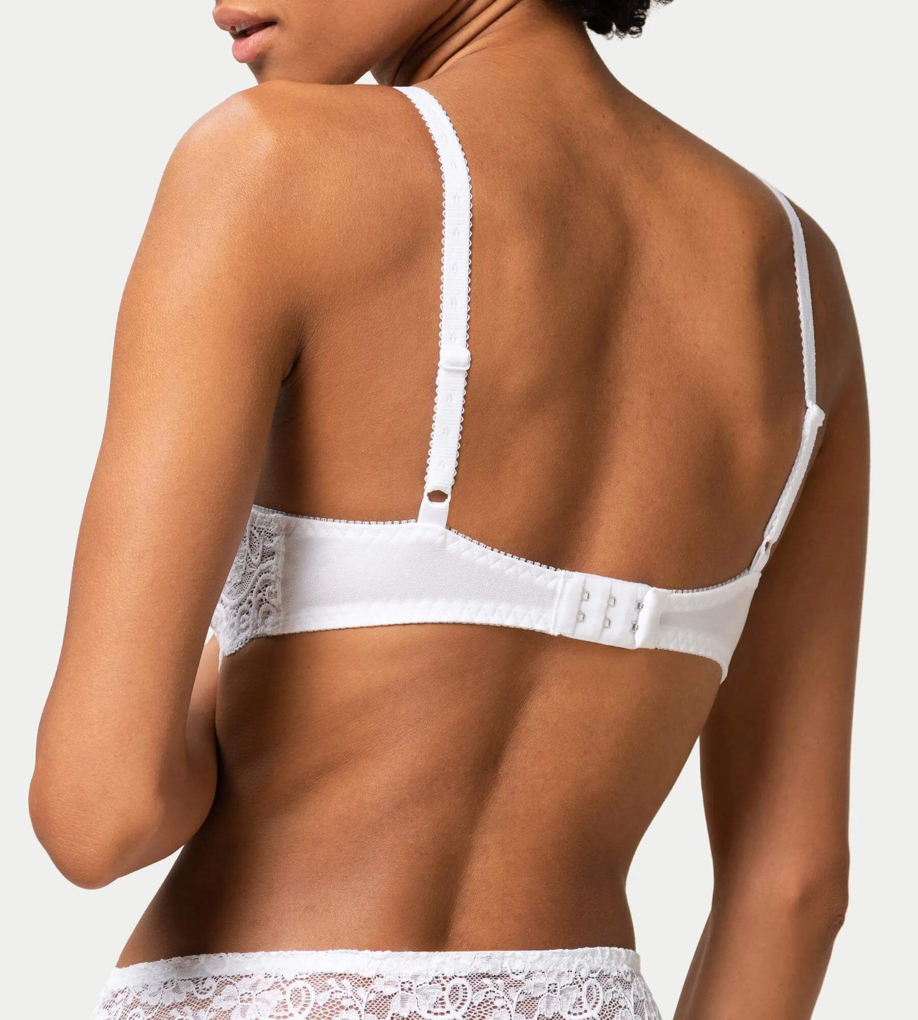 Amourette 300 white bra showcasing the back design with delicate lace and adjustable straps.