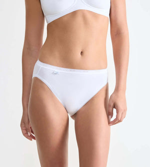 sloggi Basic+ 3-pack featuring a woman wearing white Tai Briefs from the Basic+ series, showcasing soft cotton and comfort.