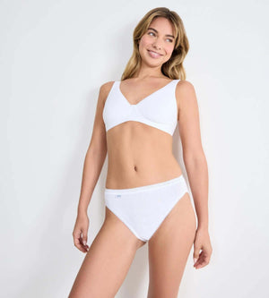 sloggi Basic+ 3-pack displaying a model wearing a white bra and matching brief, showcasing comfort and style.