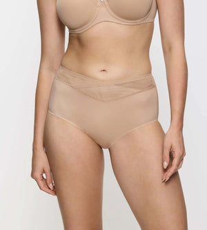 True Shape Sensation maxi brief on model showcasing seamless design and high waist fitting.