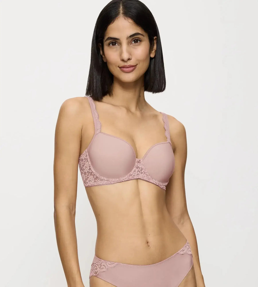 Amourette ergonomic bra with wired padded spacer cups and modern scoop back design in soft pink.