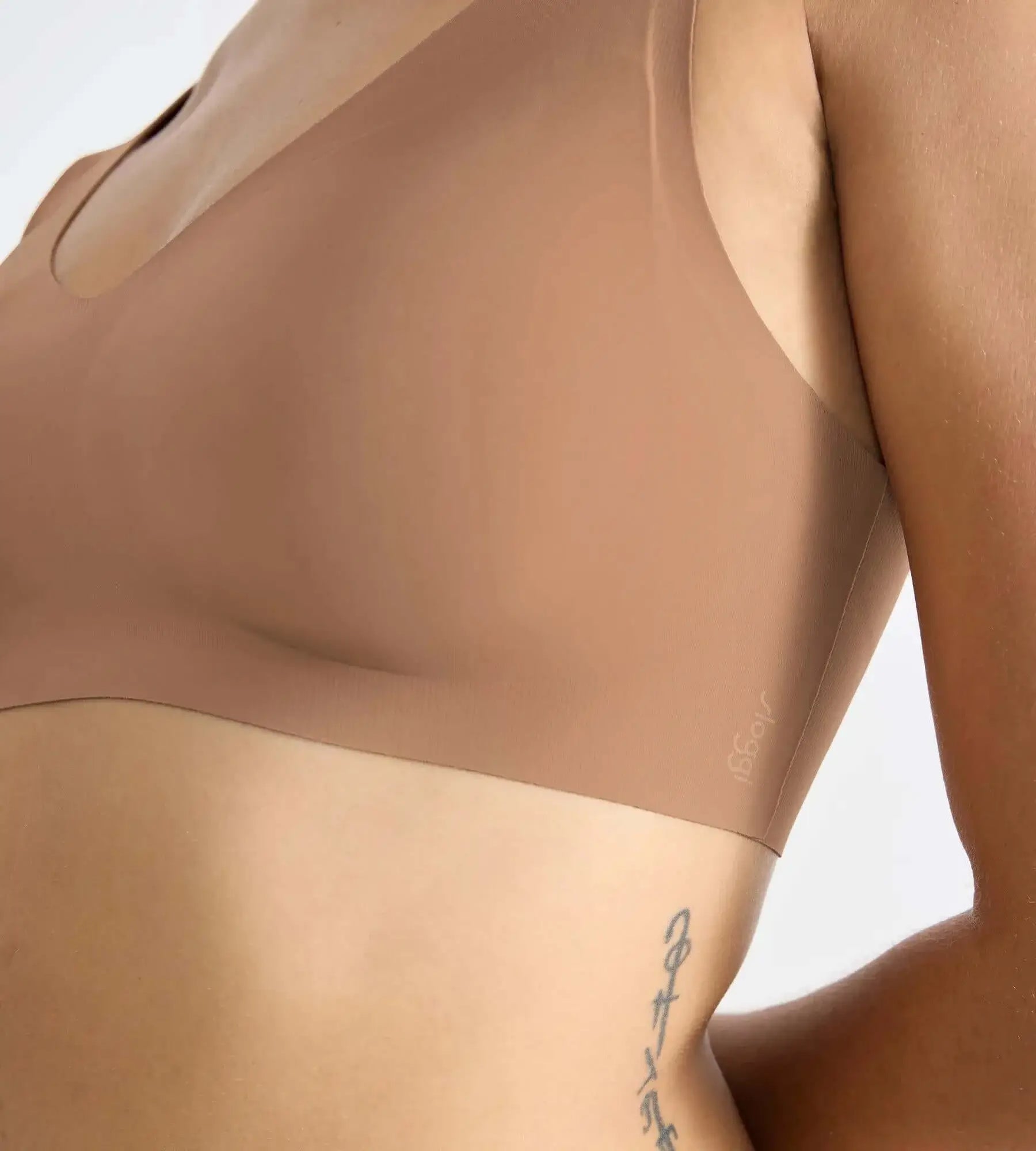sloggi ZERO Feel seamless bralette in nude, showcasing its smooth fit and innovative design.