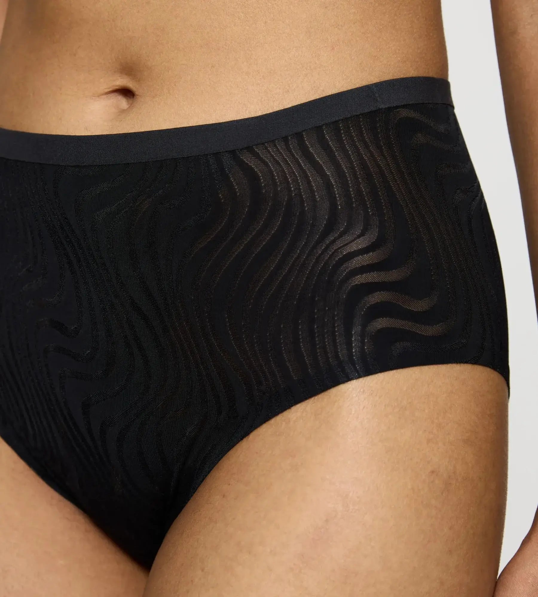 Close-up of Triumph Shape Smart Ellipse medium-coverage bikini brief showcasing soft waistband and seamless design.