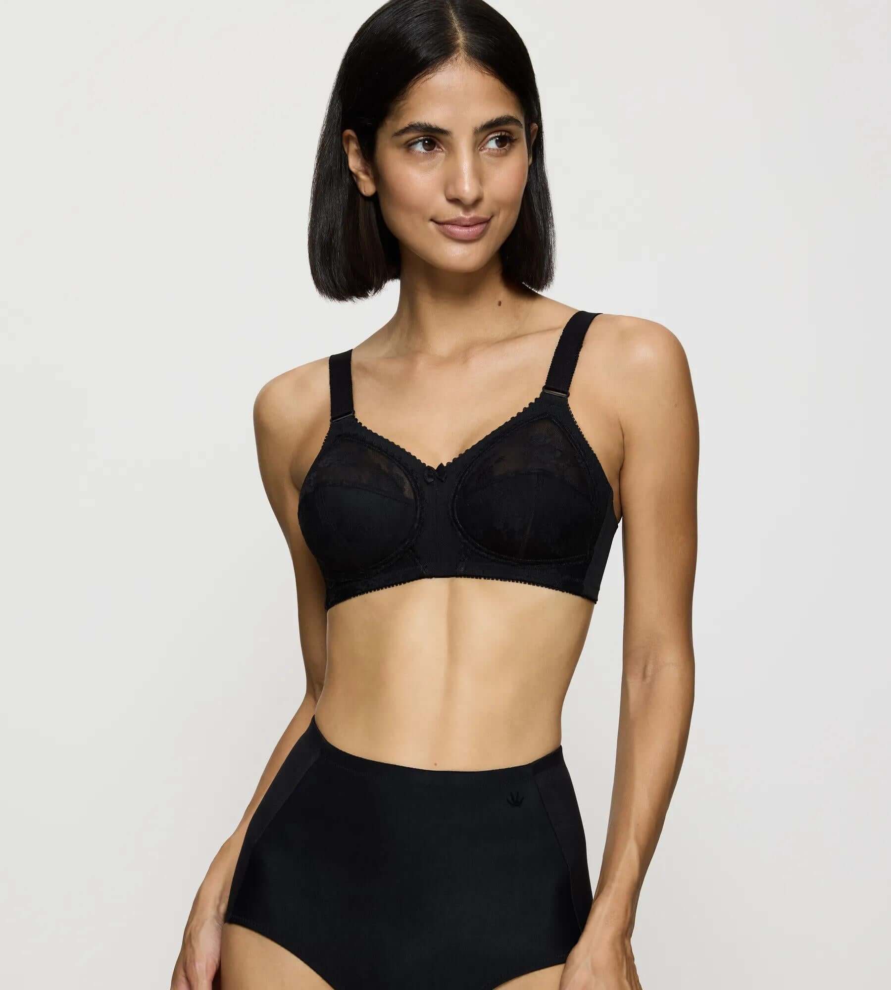 Doreen black bra on model showcasing timeless design for fuller bust support.