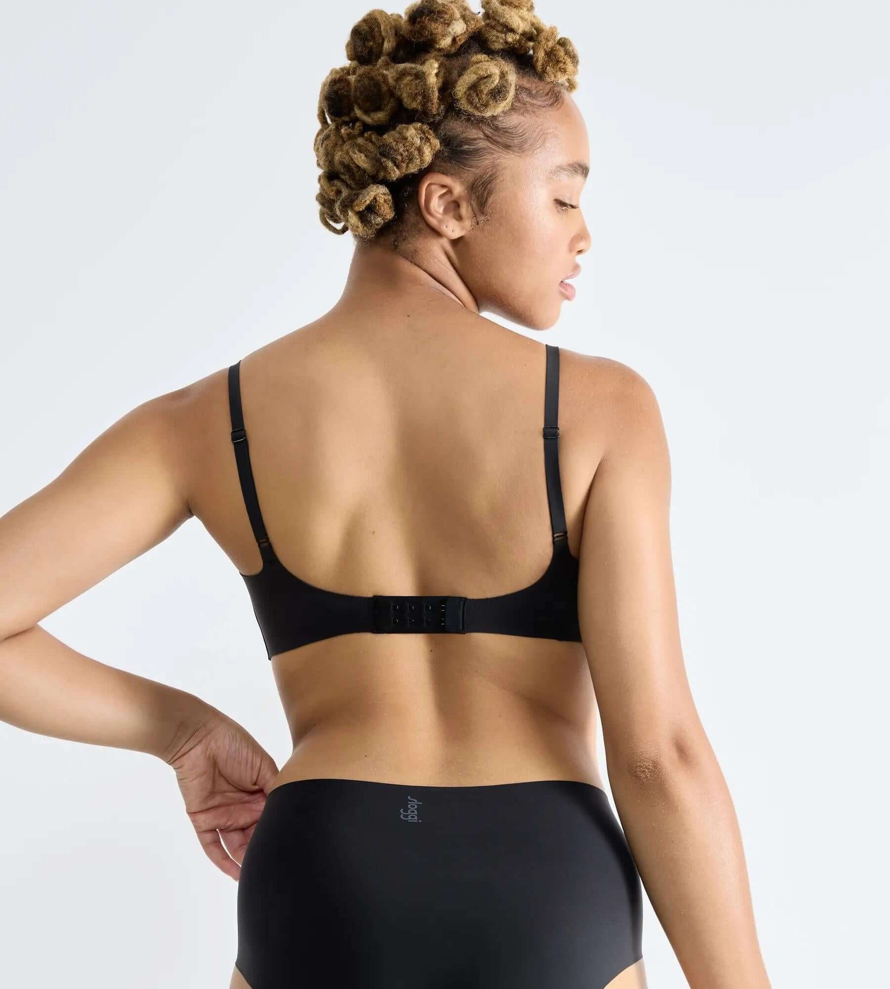 Model showcasing the back of the sloggi ZERO Feel Ultra Bra with a contemporary design and adjustable straps.