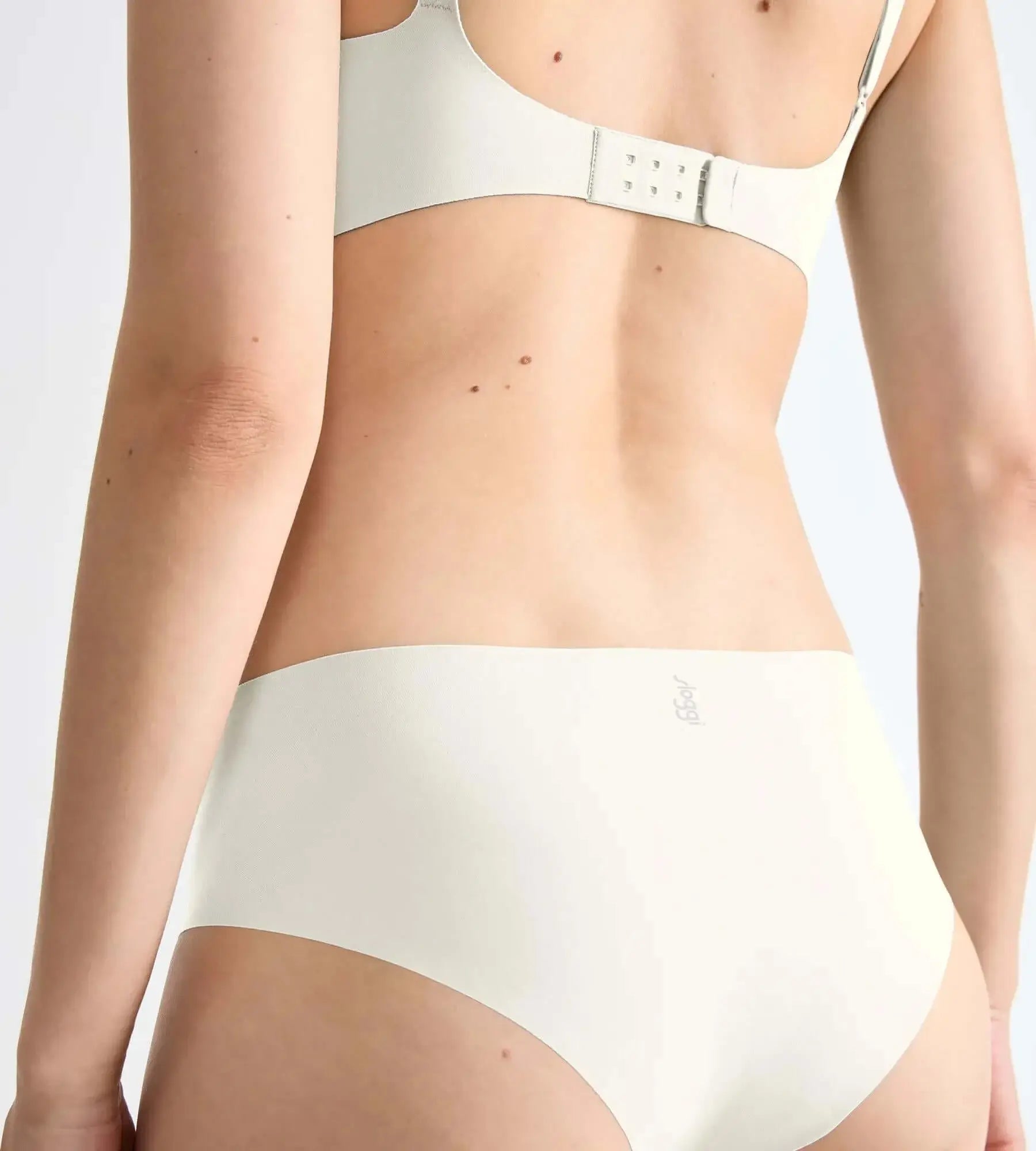 sloggi ZERO Feel seamless hipster briefs in soft white, showcasing deep sides and full coverage for ultimate comfort.