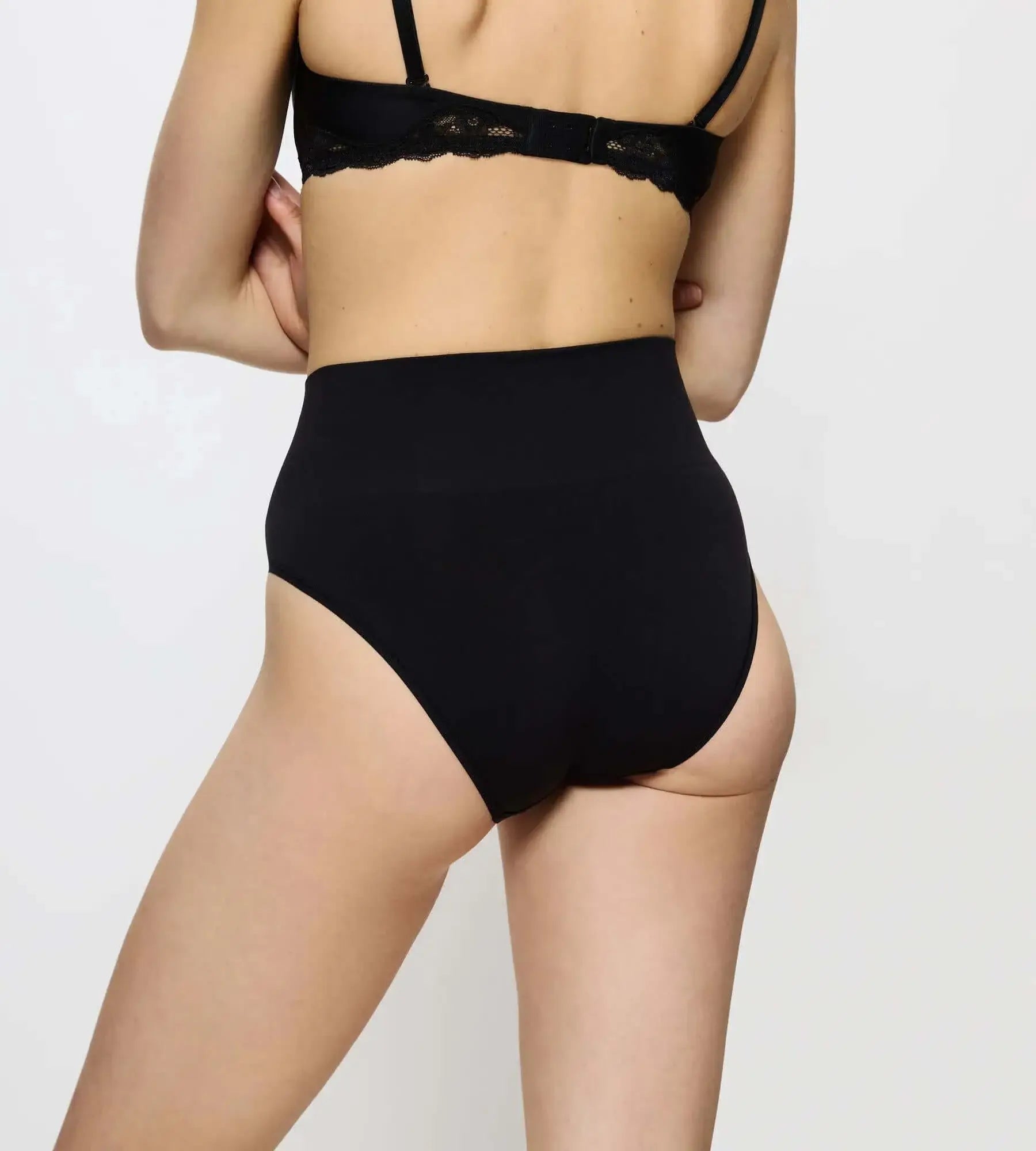 Triumph Soft Sculpt Bandeau Maxi briefs in black showing back view with smooth knit fabric and high waist design.